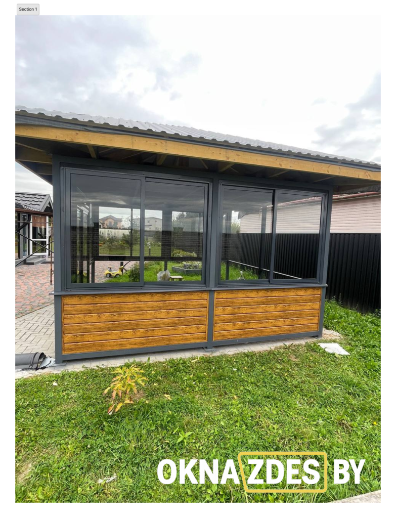 Алюминиевая раздвижная система для остекления террасы в частном доме. Профиль антрацит, вставки под дерево, панорамные стёкла, тёплый уютный дизайн