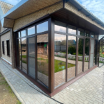 Угол веранды, ламинация тёмный дуб, бронзовый мультистеклопакет.