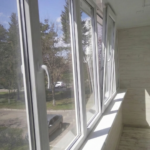 Остекление балкона Grunhaus — тёплая система с плотным прижимом